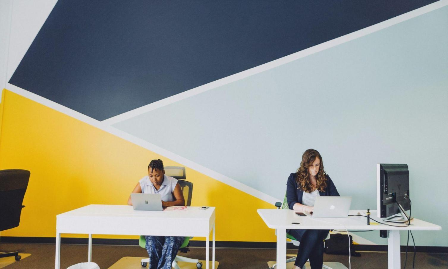 Business analyst reviewing comparative financial statements